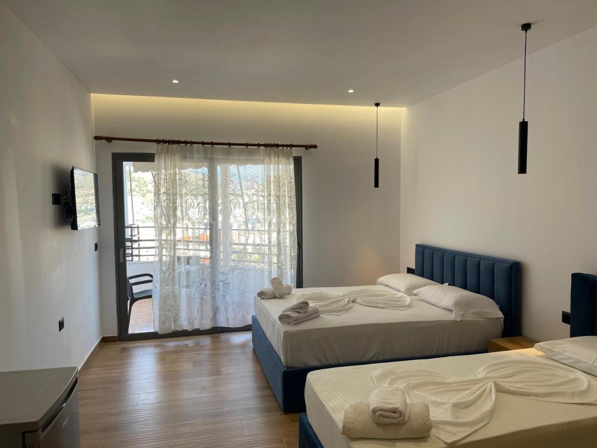 Suites Kozi Sarande Bagian luar foto