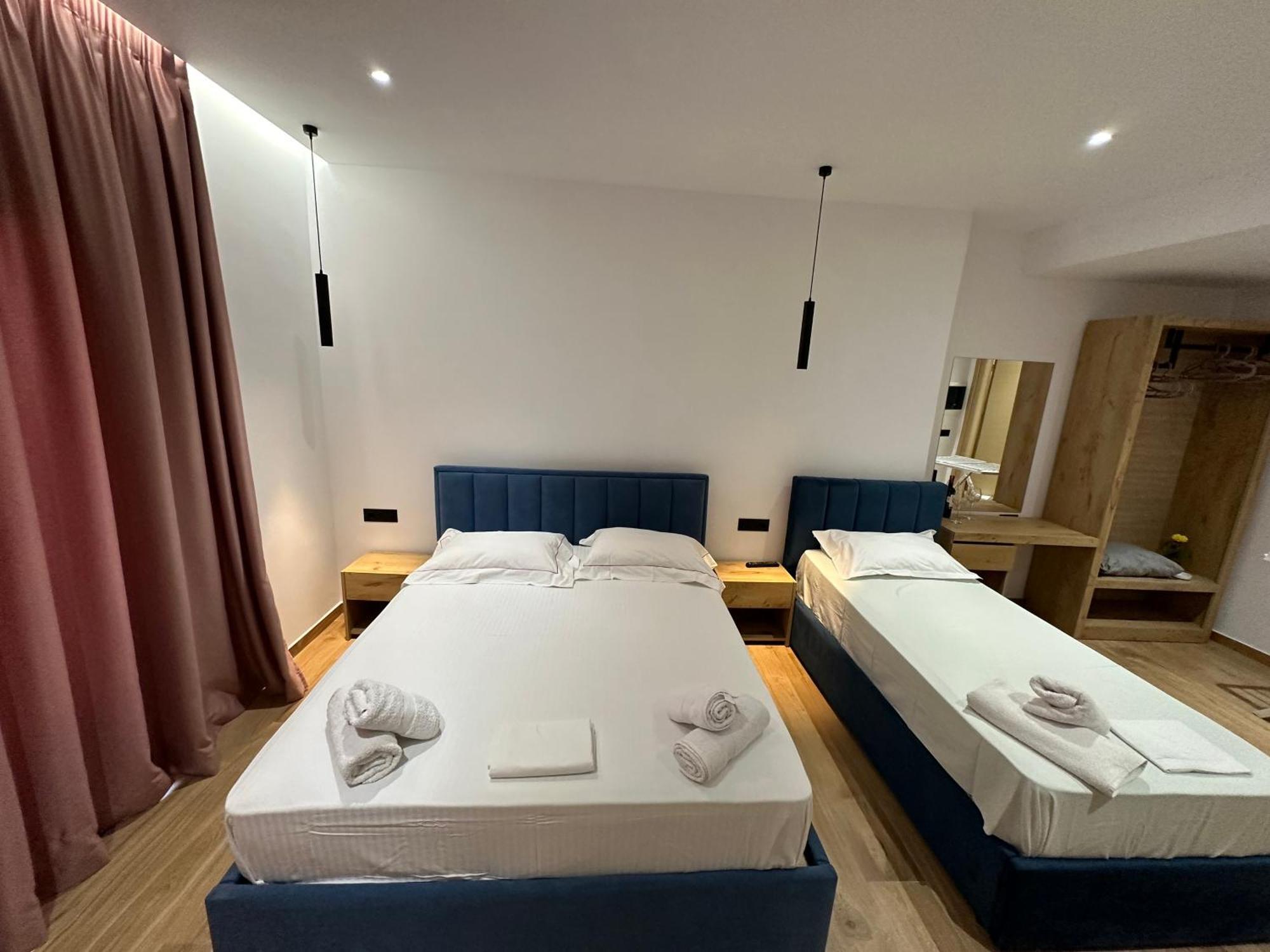 Suites Kozi Sarande Bagian luar foto